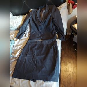 The Limited navy women's suit with knee length pencil skirt. Size 14